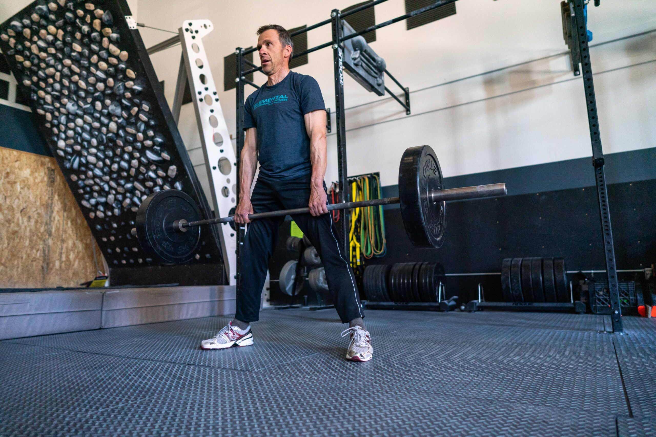 man holding kettle bell